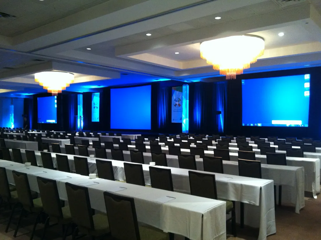 Meeting room with three screens at the Hilton Fort Lauderdale Marina